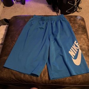 Boys blue Nike shorts